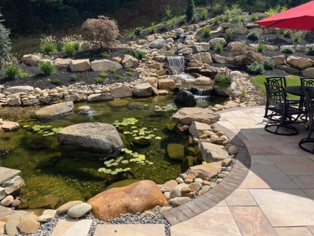 Backyard pond installed by River Valley Landscapes